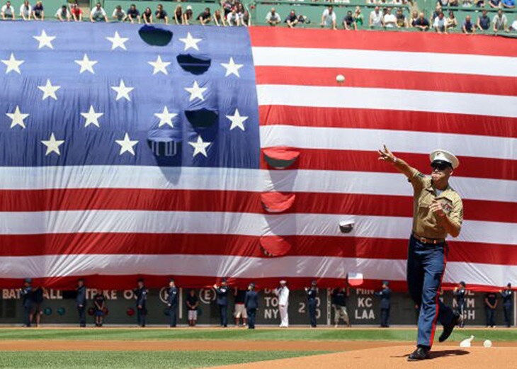 Sergeant Aaron Silton throws out the first pitch...